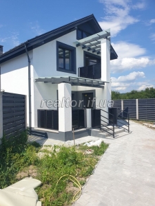 A modern house with renovation and furniture in the village of Vovchynets