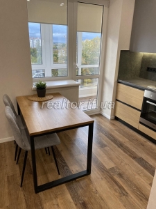 Sale of an apartment in an inhabited new building with design renovation