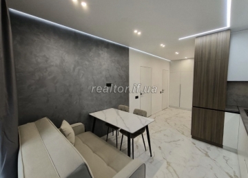 Verkauf einer modern renovierten und möblierten Einzimmerwohnung in der neuen Wohnanlage Family Plaza
