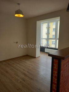 Sale of a spacious apartment with a modern layout in a new neighborhood