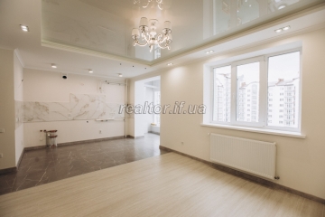 Sale of a modern apartment in the city center redeveloped into a two-bedroom