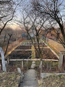 Продажа земельного участка с дачным домом в садовом обществе по улице Набережная