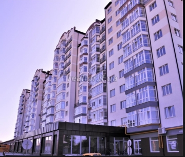 Large apartment in a ruined neighborhood of the city